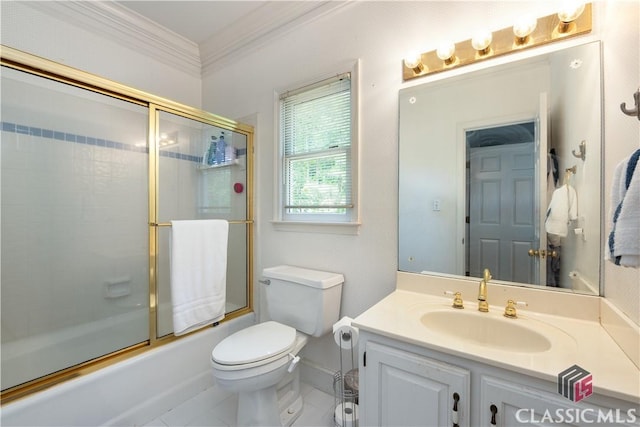 bathroom with crown molding, vanity, shower / bath combination with glass door, toilet, and tile patterned floors