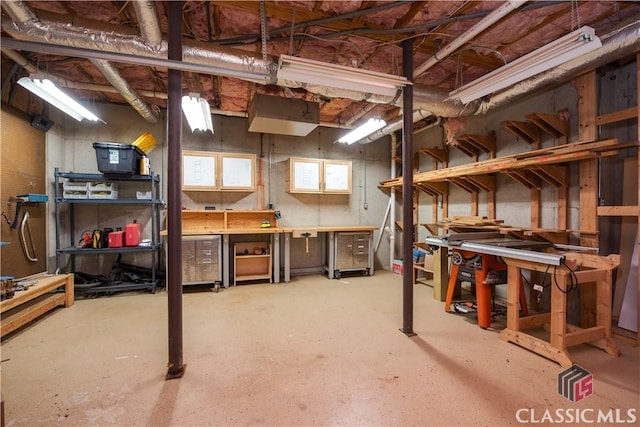 basement with a workshop area