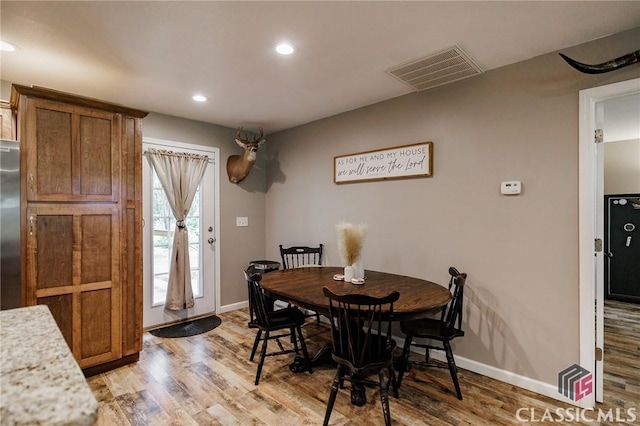 2100 New Hope Church Rd, Comer, GA 30629 - dining area featuring light wood finished floors, recessed lighting, and baseboards