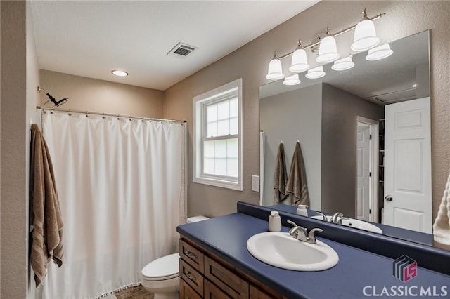 2100 New Hope Church Rd, Comer, GA 30629 - full bathroom with toilet, vanity, and a shower with shower curtain
