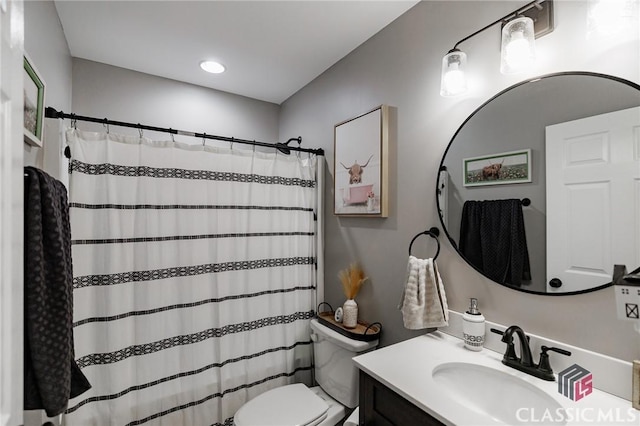 2100 New Hope Church Rd, Comer, GA 30629 - bathroom featuring toilet, vanity, a shower with shower curtain, and recessed lighting