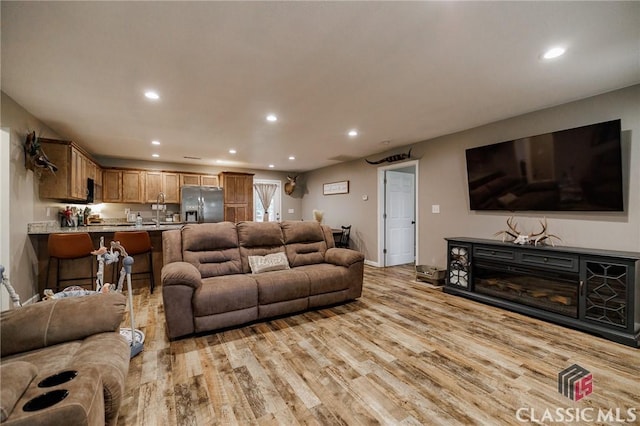 2100 New Hope Church Rd, Comer, GA 30629 - living area featuring recessed lighting, light wood-style floors, and baseboards