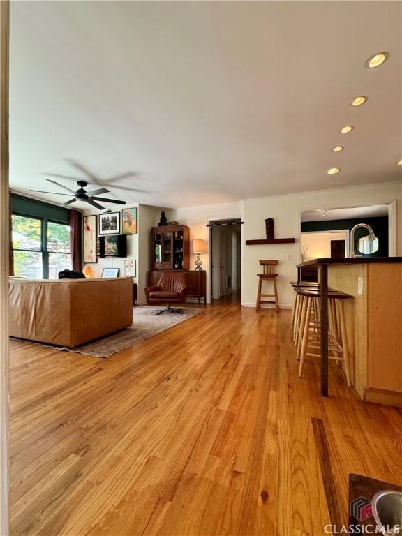 160 Gran Ellen Dr, Athens, GA 30606 - living area with light wood finished floors, ceiling fan, and recessed lighting