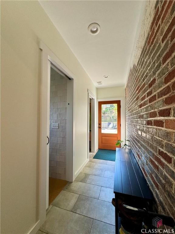 160 Gran Ellen Dr, Athens, GA 30606 - corridor featuring baseboards, brick wall, and recessed lighting