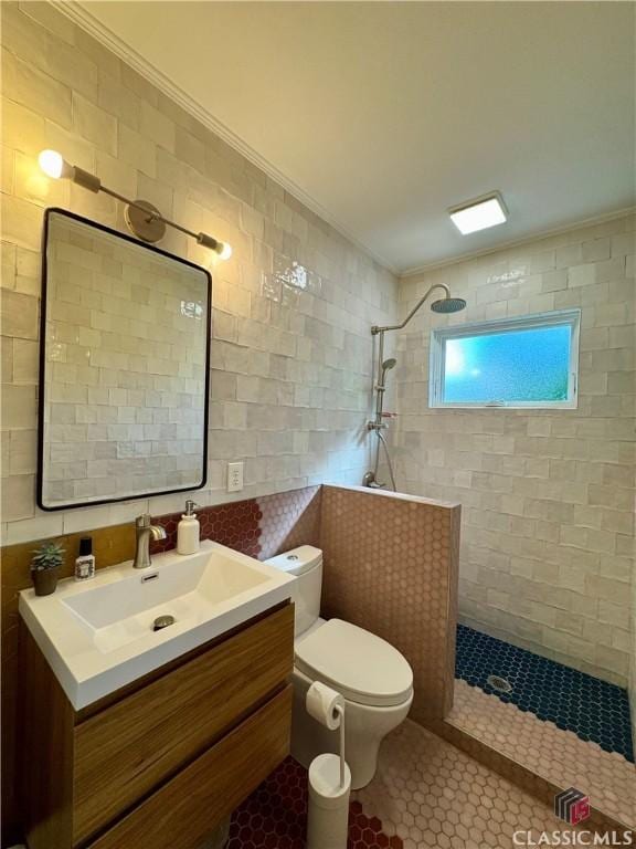 160 Gran Ellen Dr, Athens, GA 30606 - bathroom with tile walls, a walk in shower, toilet, ornamental molding, and vanity