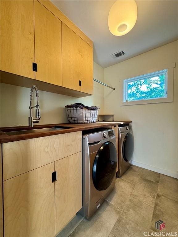 160 Gran Ellen Dr, Athens, GA 30606 - laundry room featuring cabinet space, independent washer and dryer, and baseboards