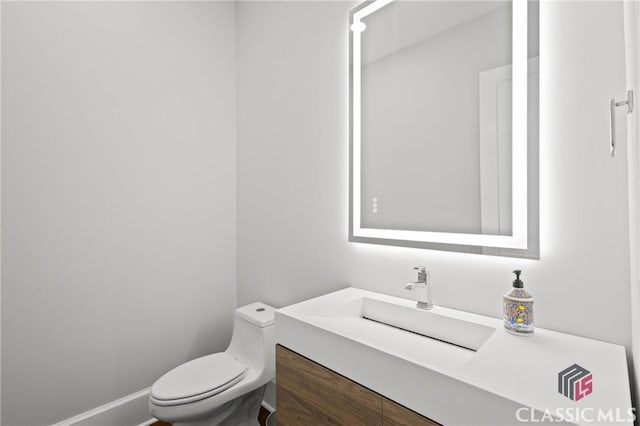 1895 Vintage Pl, Watkinsville, GA 30677 - bathroom with toilet and vanity