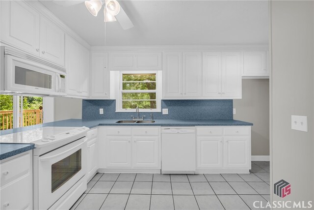 1119 John W Breedlove Rd, Monroe, GA 30656 - kitchen with white appliances, a sink, ceiling fan, and decorative backsplash