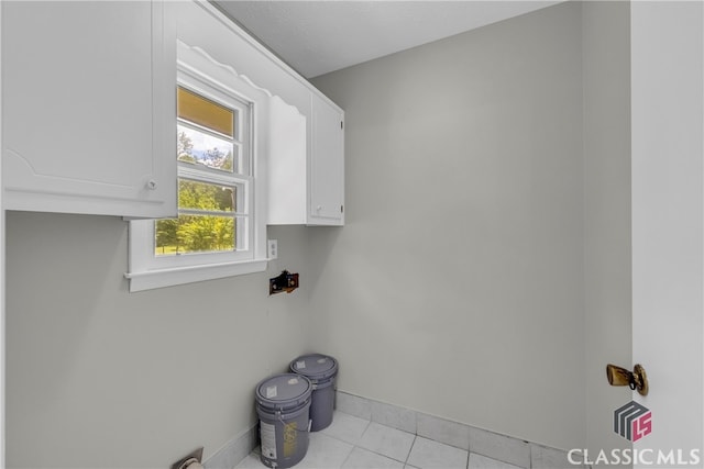 1119 John W Breedlove Rd, Monroe, GA 30656 - laundry area with baseboards and light tile patterned flooring