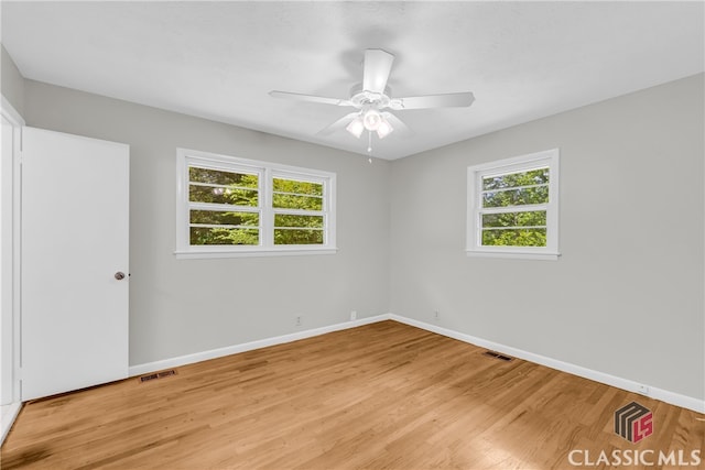 1119 John W Breedlove Rd, Monroe, GA 30656 - unfurnished bedroom featuring baseboards, light wood-type flooring, and ceiling fan