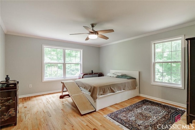 115 Crystal Creek Ct, Hull, GA 30646 - bedroom with crown molding, light wood finished floors, baseboards, and ceiling fan