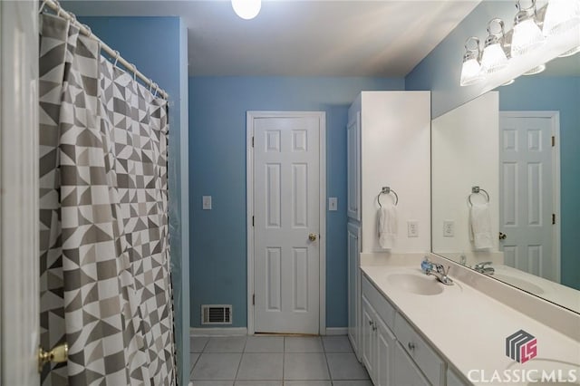 115 Crystal Creek Ct, Hull, GA 30646 - full bath with tile patterned flooring, vanity, baseboards, and a shower with shower curtain