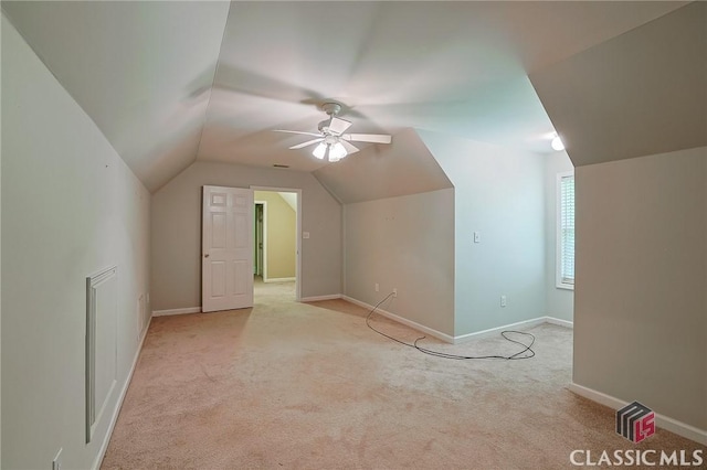 115 Crystal Creek Ct, Hull, GA 30646 - additional living space with light colored carpet, vaulted ceiling, a ceiling fan, and baseboards