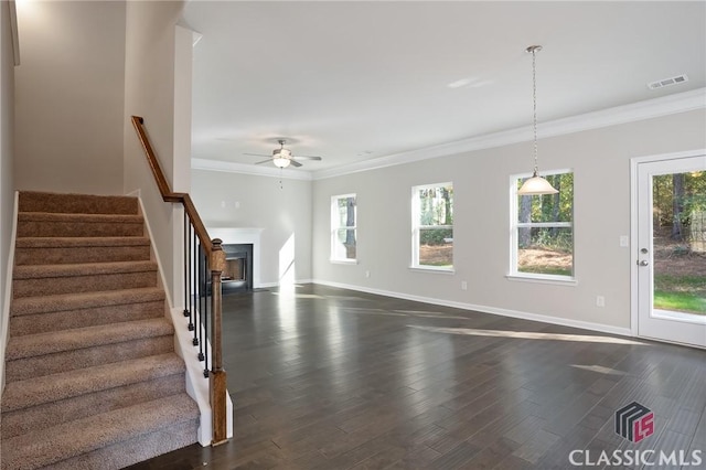 174 Water Oak Way, Crawford, GA 30630 - unfurnished living room with ceiling fan, ornamental molding, stairway, dark wood-style floors, and baseboards