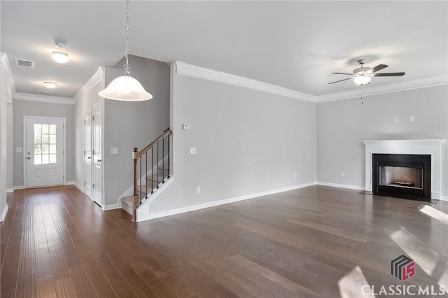 174 Water Oak Way, Crawford, GA 30630 - unfurnished living room featuring stairs, a ceiling fan, baseboards, crown molding, and dark wood-type flooring