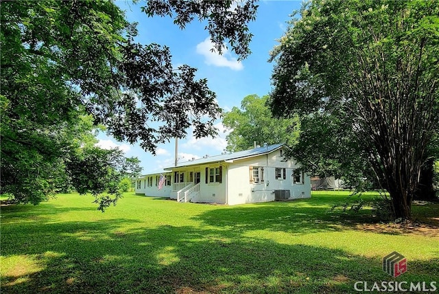 75 Gunnell Rd, Comer, GA 30629 - rear view of house featuring a lawn and central AC