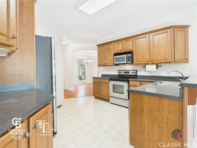 1090 Lane Creek Cir, Bishop, GA 30677 - kitchen featuring appliances with stainless steel finishes, a sink, crown molding, dark countertops, and brown cabinets
