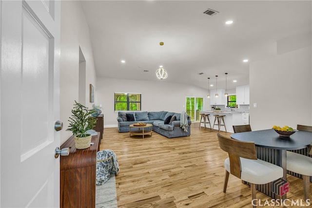 3920 Old Lexington Rd, Athens, GA 30605 - living area with light wood-style flooring, recessed lighting, lofted ceiling, and baseboards