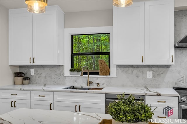 3920 Old Lexington Rd, Athens, GA 30605 - kitchen with a sink, appliances with stainless steel finishes, decorative backsplash, and white cabinetry