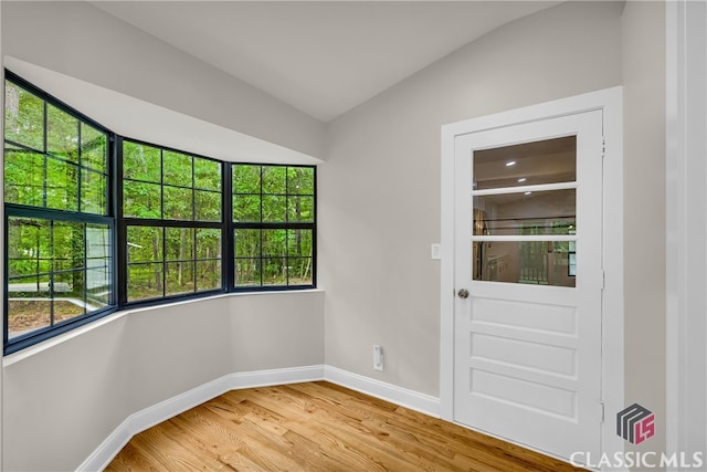 3920 Old Lexington Rd, Athens, GA 30605 - doorway with baseboards and light wood-style flooring