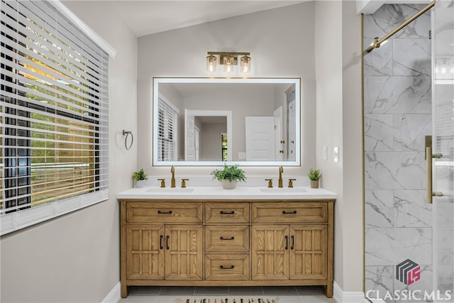3920 Old Lexington Rd, Athens, GA 30605 - full bathroom with a marble finish shower, double vanity, baseboards, and tile patterned floors