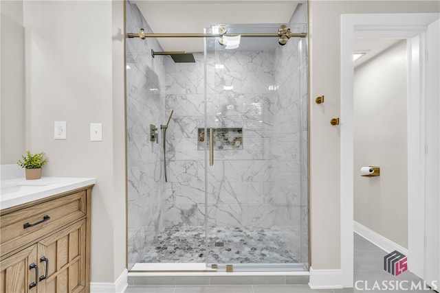 3920 Old Lexington Rd, Athens, GA 30605 - bathroom with a marble finish shower, vanity, and baseboards