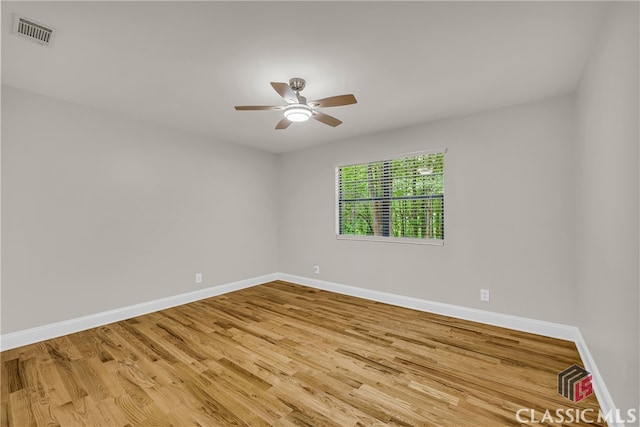 3920 Old Lexington Rd, Athens, GA 30605 - unfurnished room featuring baseboards, wood finished floors, and a ceiling fan