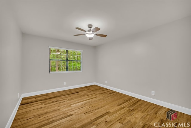 3920 Old Lexington Rd, Athens, GA 30605 - unfurnished room with baseboards and wood finished floors