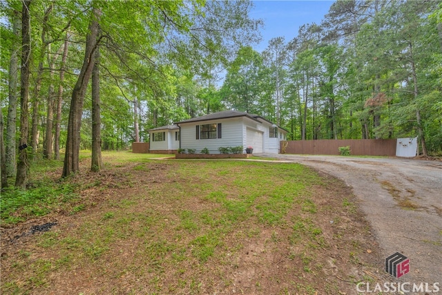 3920 Old Lexington Rd, Athens, GA 30605 - view of front facade with asphalt driveway and a garage