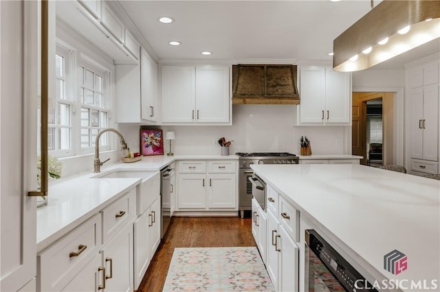 155 Wexford Pl, Athens, GA 30609 - kitchen featuring premium range hood, stainless steel appliances, white cabinets, recessed lighting, and light countertops