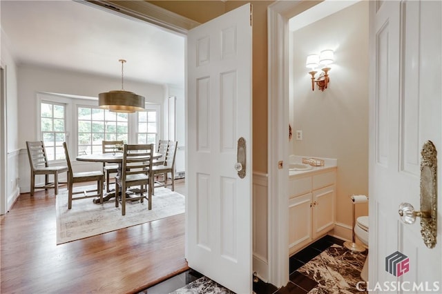 155 Wexford Pl, Athens, GA 30609 - hallway with baseboards and dark wood-style floors