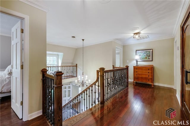 155 Wexford Pl, Athens, GA 30609 - hallway featuring an upstairs landing, a chandelier, hardwood / wood-style flooring, crown molding, and baseboards