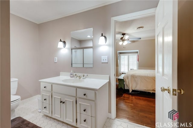 155 Wexford Pl, Athens, GA 30609 - ensuite bathroom featuring a ceiling fan, toilet, tile patterned floors, vanity, and an enclosed shower