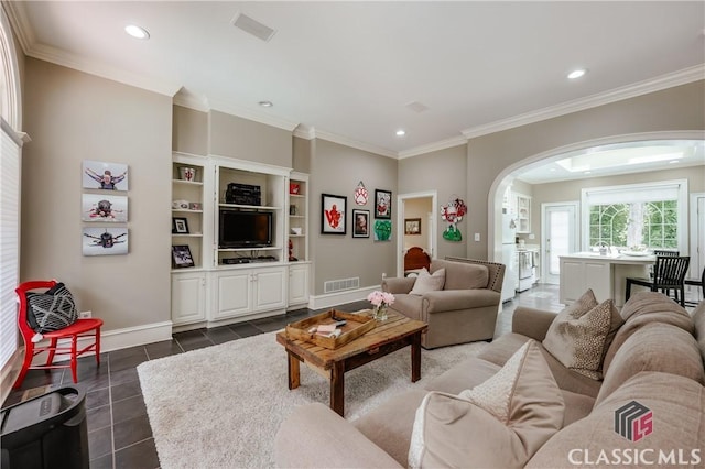 155 Wexford Pl, Athens, GA 30609 - living area featuring arched walkways, dark tile patterned flooring, recessed lighting, crown molding, and baseboards