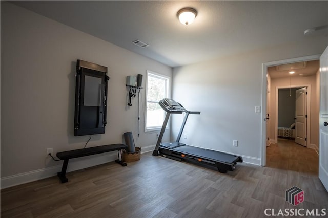 35 Westwood St, Danielsville, GA 30633 - workout area featuring attic access, wood finished floors, and baseboards