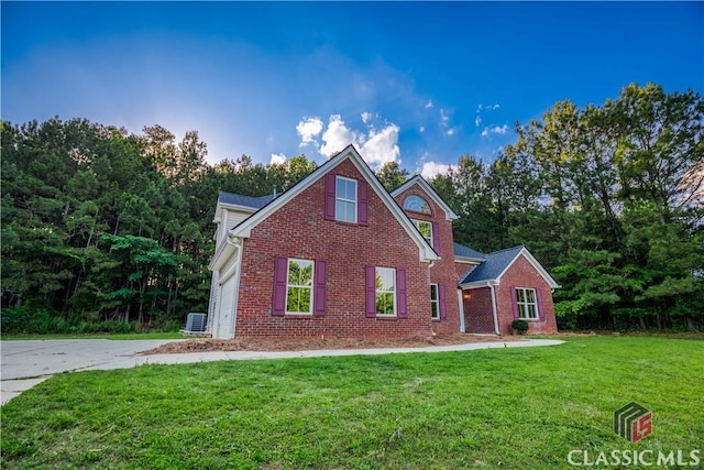 4085 Fawn Vly, Loganville, GA 30052 - view of front of house with brick siding and a front lawn