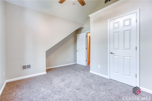 4085 Fawn Vly, Loganville, GA 30052 - additional living space featuring vaulted ceiling, carpet, a ceiling fan, and baseboards