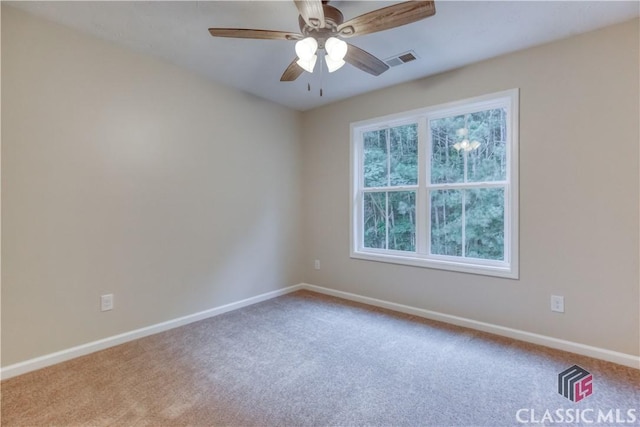 4085 Fawn Vly, Loganville, GA 30052 - carpeted empty room featuring baseboards and ceiling fan