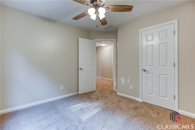 4085 Fawn Vly, Loganville, GA 30052 - unfurnished bedroom with carpet flooring, baseboards, and ceiling fan