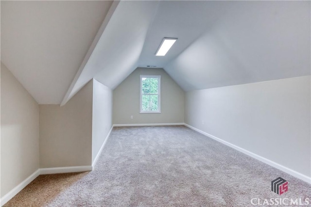 4085 Fawn Vly, Loganville, GA 30052 - additional living space featuring carpet floors, baseboards, and lofted ceiling