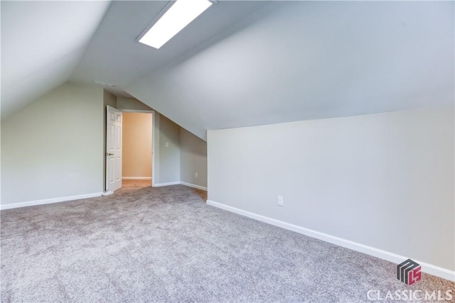 4085 Fawn Vly, Loganville, GA 30052 - bonus room with carpet flooring, vaulted ceiling, and baseboards