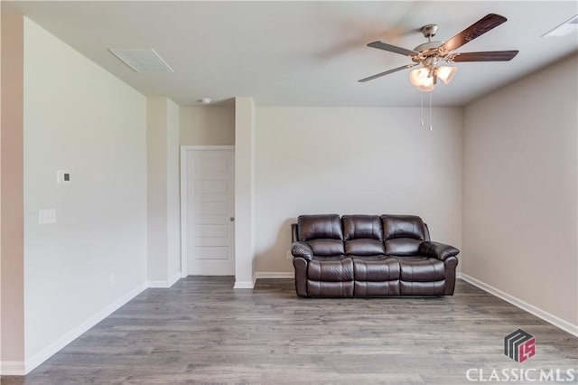 334 Pepin Ct, Hoschton, GA 30548 - living area featuring ceiling fan, wood finished floors, and baseboards