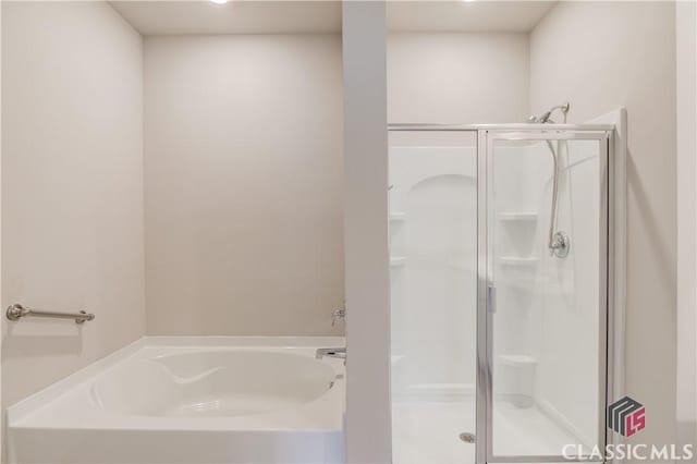 334 Pepin Ct, Hoschton, GA 30548 - bathroom featuring a shower stall and a bath