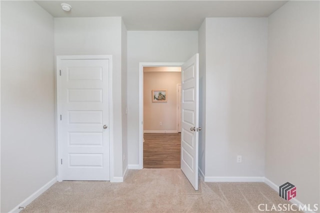 334 Pepin Ct, Hoschton, GA 30548 - unfurnished bedroom with carpet flooring and baseboards