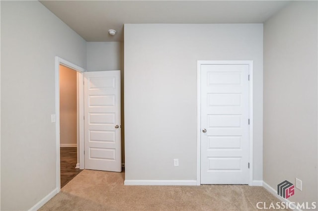 334 Pepin Ct, Hoschton, GA 30548 - unfurnished bedroom with carpet flooring and baseboards