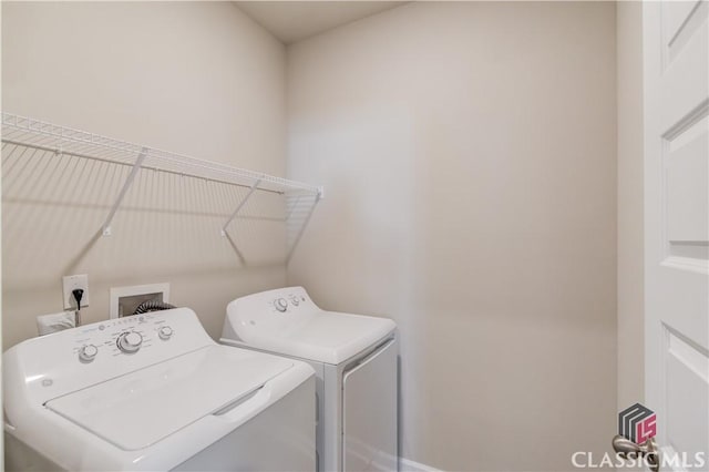 334 Pepin Ct, Hoschton, GA 30548 - laundry room with washer and clothes dryer