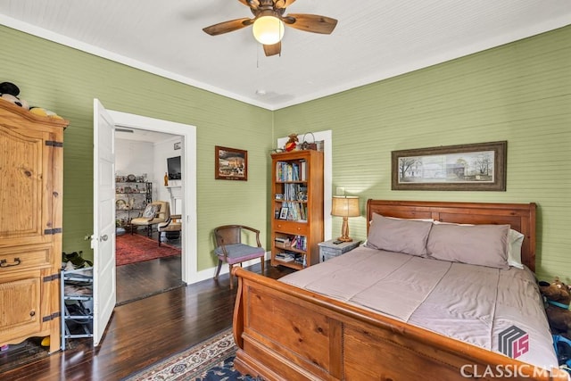 99 Hickory St, Commerce, GA 30529 - bedroom featuring dark wood finished floors, baseboards, and ceiling fan