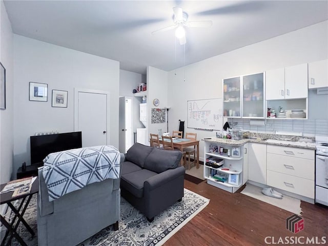 485 Meigs St, Athens, GA 30601 - living area featuring dark wood-style flooring, a ceiling fan, and a desk