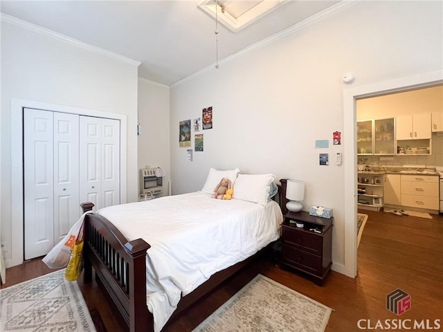 485 Meigs St, Athens, GA 30601 - bedroom with crown molding, wood finished floors, and a closet