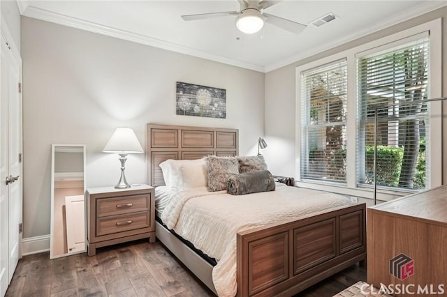 1050 Tailwater Unit A, Greensboro, GA 30642 - bedroom featuring multiple windows, dark wood finished floors, crown molding, and baseboards